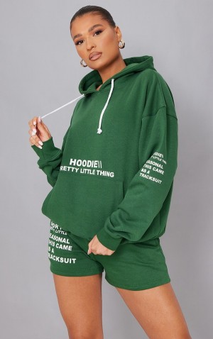 Green Pretty Little Thing Forest Oversized Graphic Print Pocket Front Sweatshirts | XBUNCSP-53