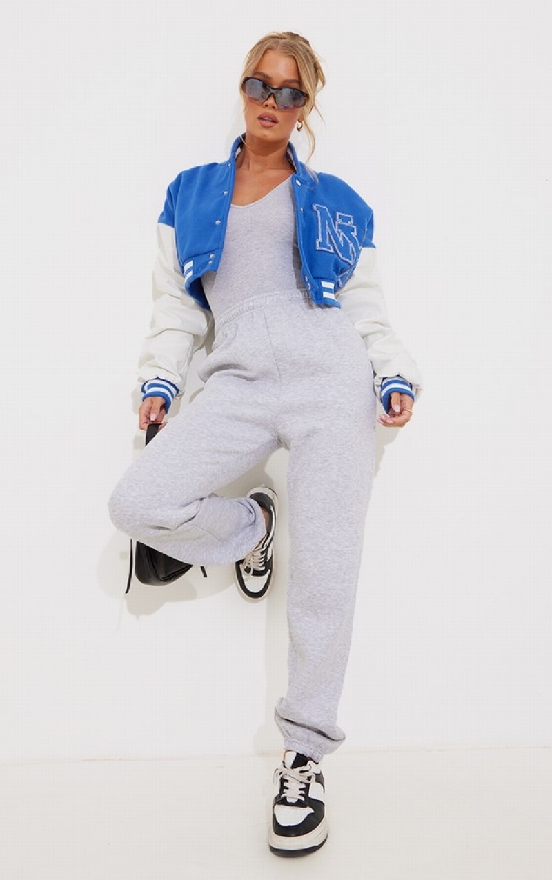 Blue Pretty Little Thing Graphic Front Faux Leather Ruched Sleeve Cropped Bomber Jackets | ZSOTQPW-53