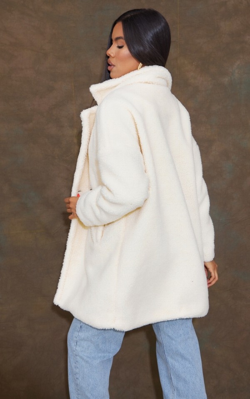 Cream Pretty Little Thing Borg Lapel Drop Arm Coats | DBQEXHR-94