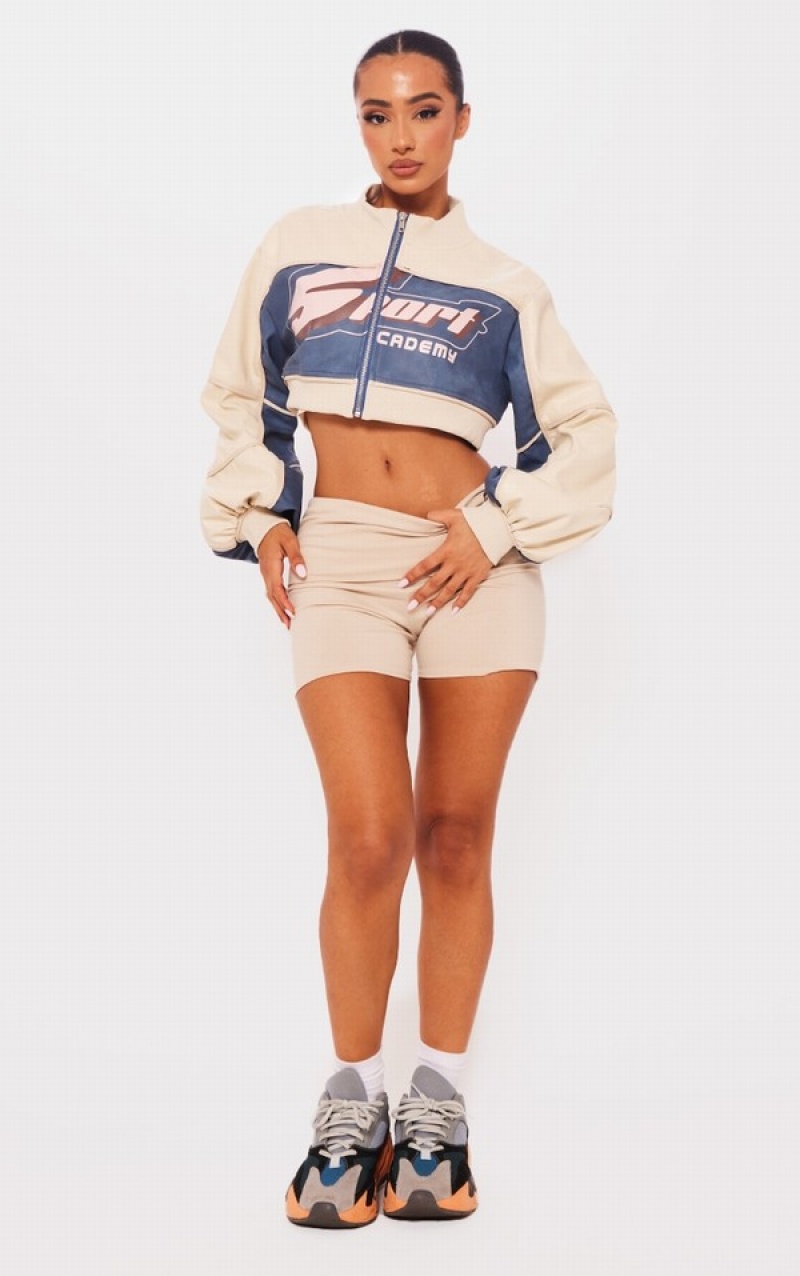 Cream Pretty Little Thing Petite PU Cropped Racer Jackets | HUVKLRT-48