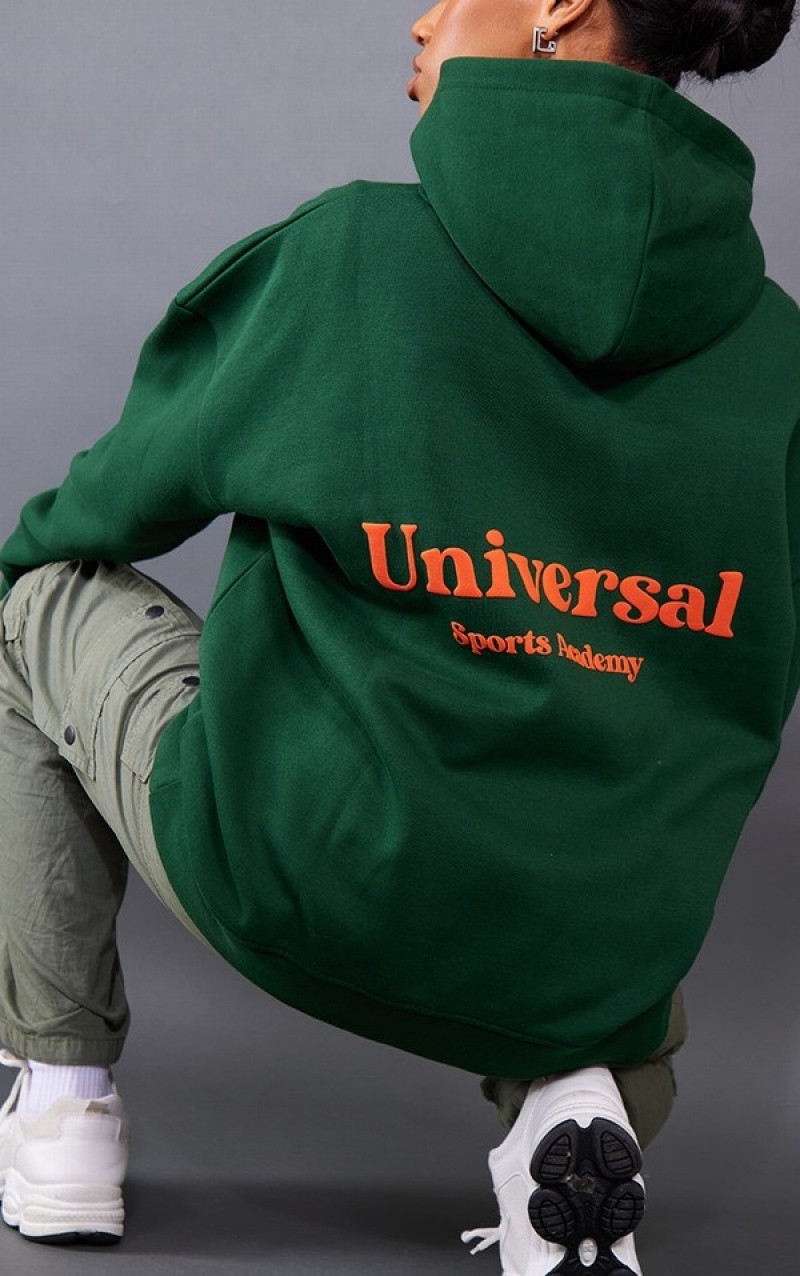 Dark Green Pretty Little Thing Universal Sports Academy Print Hoodie | RDXTOSQ-35