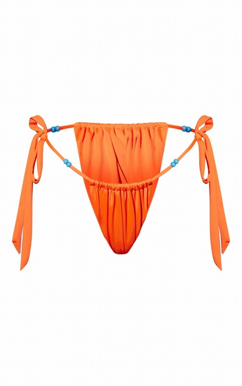 Orange Pretty Little Thing Beaded Tie Side Bikini Bottoms | IXNKRZD-42