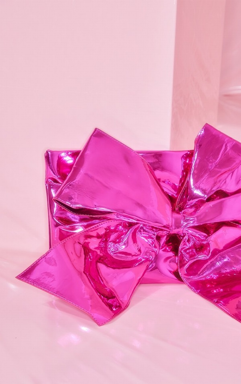 Pink Pretty Little Thing Metallic Oversized Bow Clutch Bags | RELDYIS-02